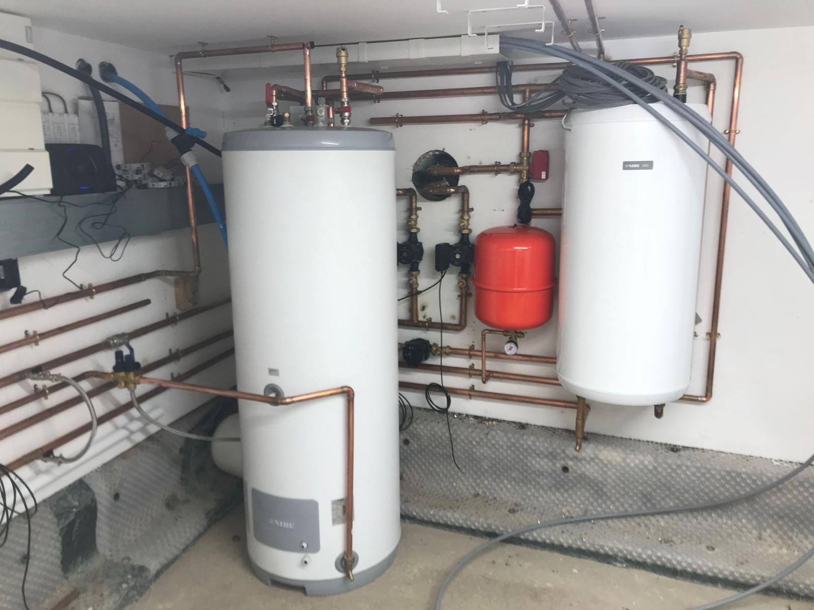 Plant room with NIBE cylinder and expansion vessel